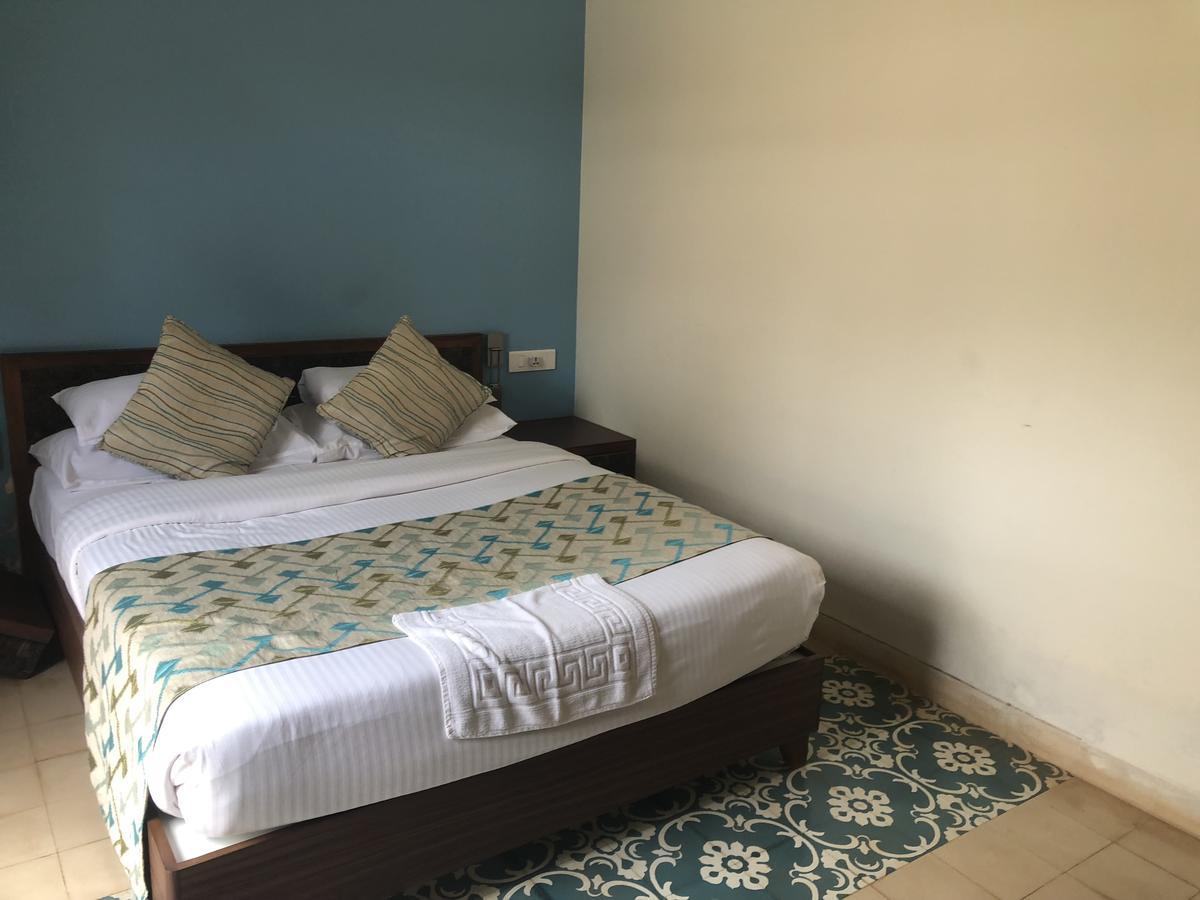 Coco Goa Hotel อาร์โปรา ภายนอก รูปภาพ